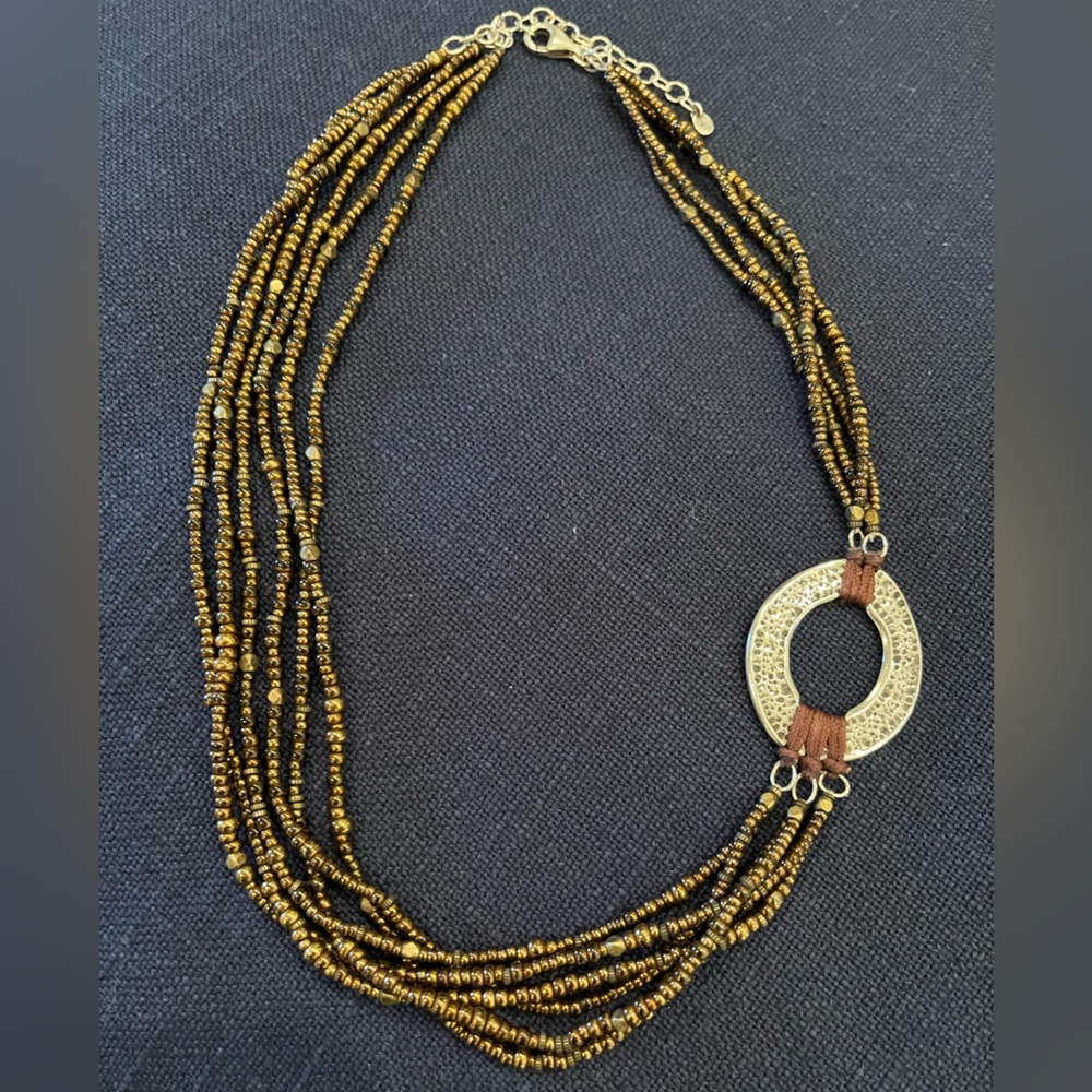 Silpada beaded multi strand necklace with sterling silver pendant.